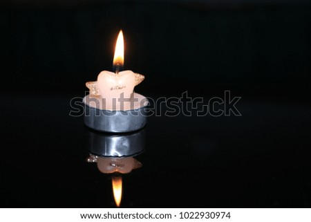 Heart candle that expresses romantic love.