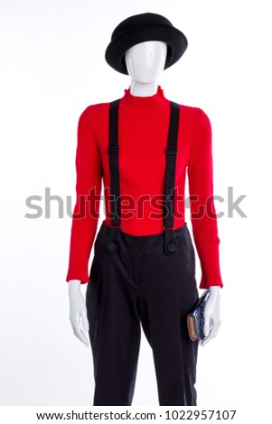 Black hat and trousers with suspenders. Red casual sweater for women. Fall outfit idea.