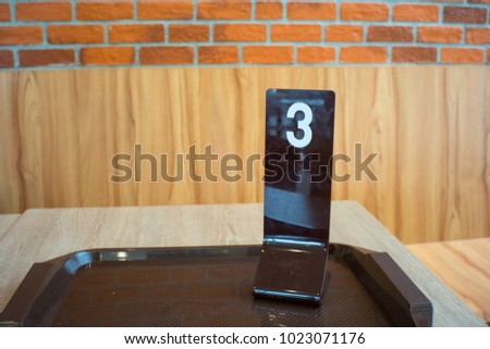 Table Number 3 in a restaurant