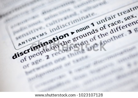 Close up to the dictionary definition of Discrimination Royalty-Free Stock Photo #1023107128
