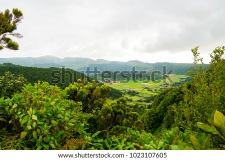 Beautiful nature view on Azores with small villages, tows, green nature fields. Amazing Azores.