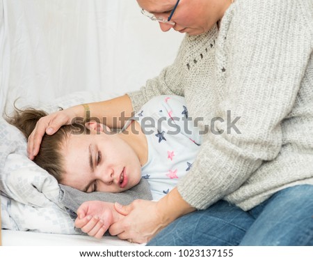 A child with epilepsy during a seizure Royalty-Free Stock Photo #1023137155
