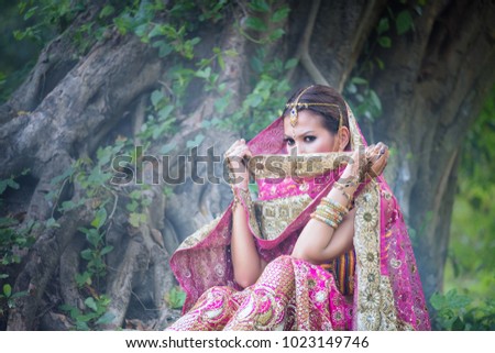 Close up Beautiful indian girl Young hindu woman model with kundan jewelry.