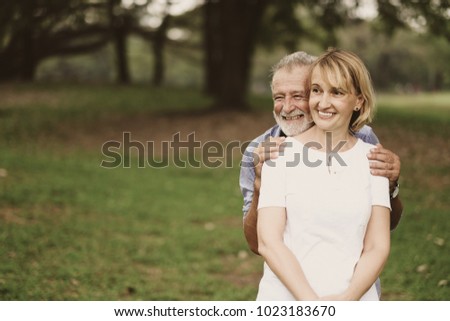 Portrait caucasian senior woman and old man, couple elder in love happy in park