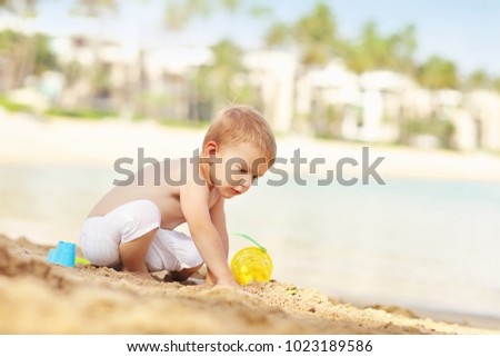 Picture of a two year old boy on vacations at beach