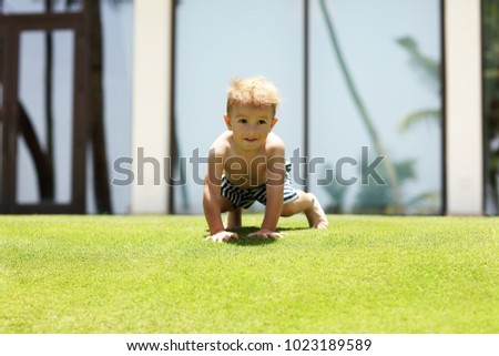 Picture of a two year old boy on vacations at beach