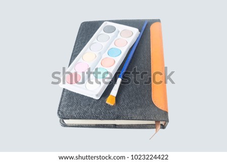 Black leather covered diary with pen color kit