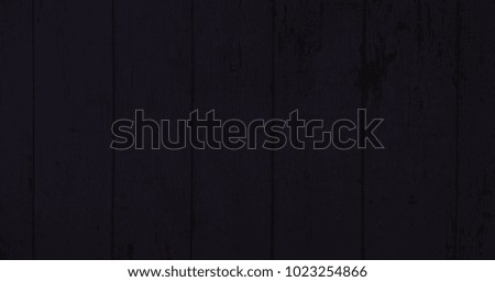 Wood texture background, black wooden planks. Grunge washed wood table pattern top view