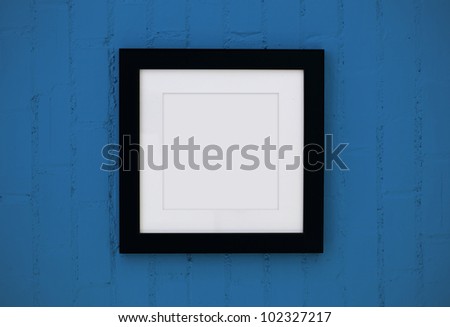 black wood frame on the wall