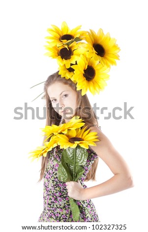 Girl on the white background with sunflower seeds