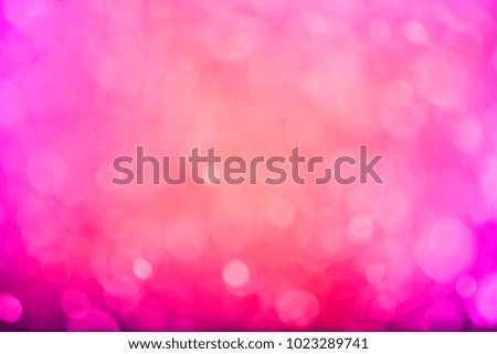 Abstract bokeh background in shades of blurry lights red purple and pink. Panoramic view
