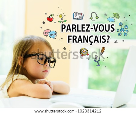 Parlez Vous Francais text with little girl using her laptop