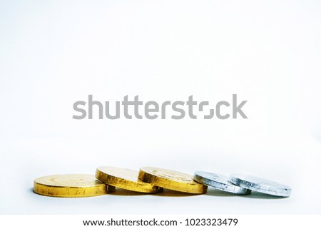 Gold and silver chocolate coins in wrappers