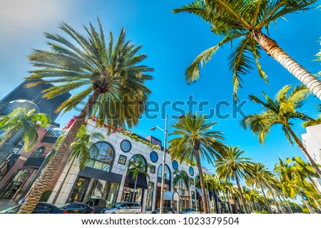 Rodeo Drive under a shining sun, Beverly Hills. California, USA Royalty-Free Stock Photo #1023379504