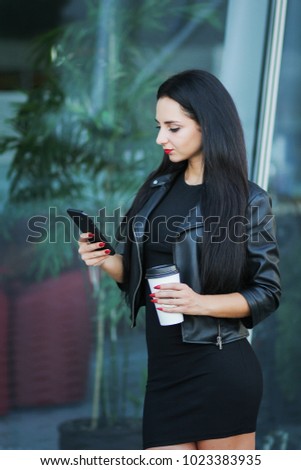 Businesswoman Using Digital Smartphone and Drink Coffee Near Beside Office Building