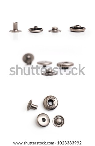Metal button set  and disassembled into pieces.Linear design