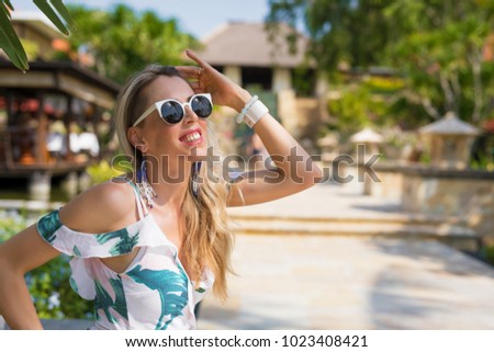 Woman enjoying tropical summer weather