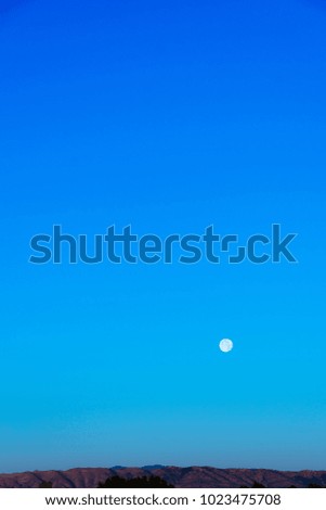 mountain range moon and sky