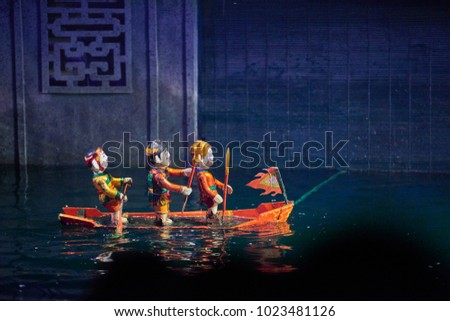 Traditional Vietnamese water puppet show in Hanoi, Vietnam. Royalty-Free Stock Photo #1023481126