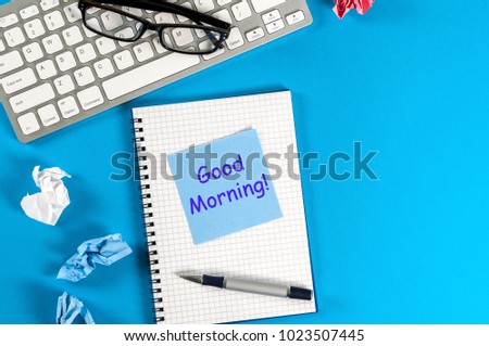 Good morning wishes in note at workplace at office or home. With empty space for text, mockup