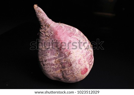 Beetroot beet on black reflective studio background. Isolated black shiny mirror mirrored background for every concept...