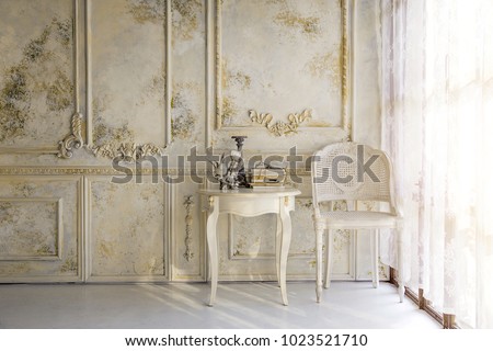 unique decoration living room antique vintage style in morning light from window background Royalty-Free Stock Photo #1023521710