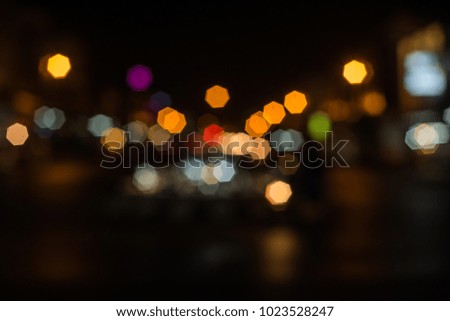 Bokeh white light of car lights at night.