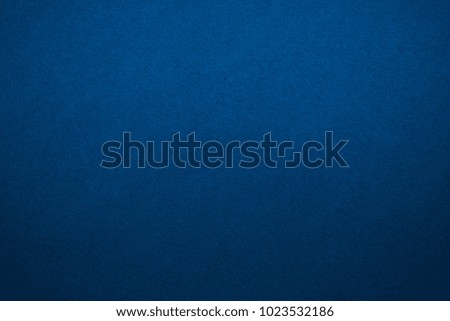 Texture of blue color paper sheet for blank backgrounds