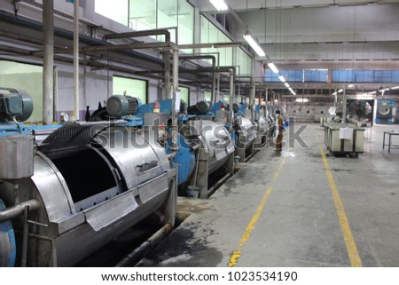 Corporate Textile Factory shoot with various pictures of industrial machines used.