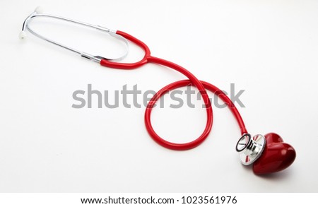 Red stethoscope with red heart and doctor white background, heart health, health insurance concept, world health day, doctor day, world hypertension day