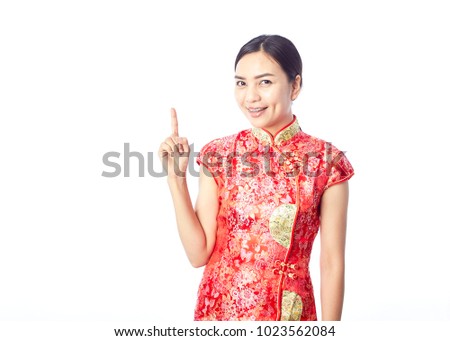 Asian girl greeting in traditional Chinese new year