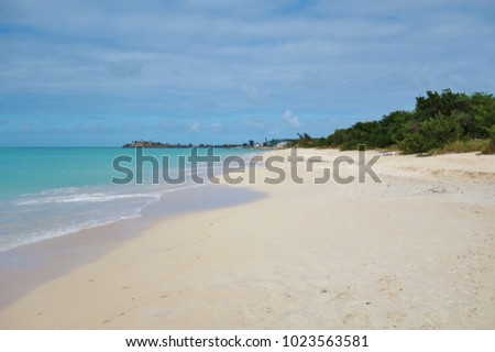 Runaway Beach on Dickenson Bay in Antigua Royalty-Free Stock Photo #1023563581