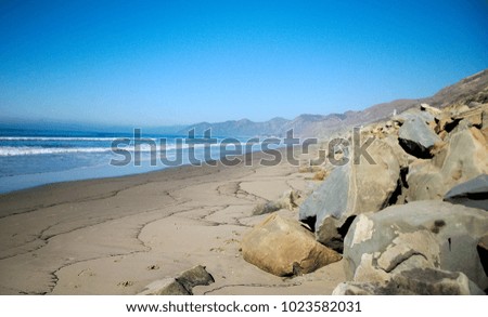 California Coastline view of the ocean and rocks.