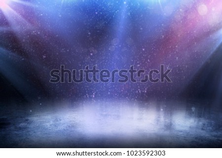 Background. Beautiful empty winter background and empty ice rink with lights. Royalty-Free Stock Photo #1023592303