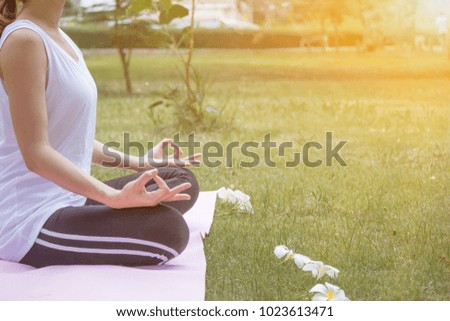 The young woman is praying and symbolizing the Buddhist and Christian faiths, praying to God in the morning, and requesting to find success and happiness.
The concept of religion and God
