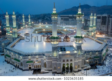 Prayer and Tawaf of Muslims Around AlKaaba in Mecca, Saudi Arabia, Aerial Top View Royalty-Free Stock Photo #1023635185