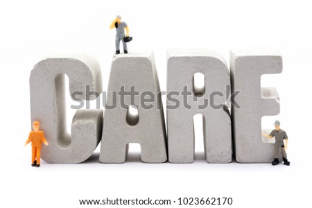 care word from cement letters and worker figure
