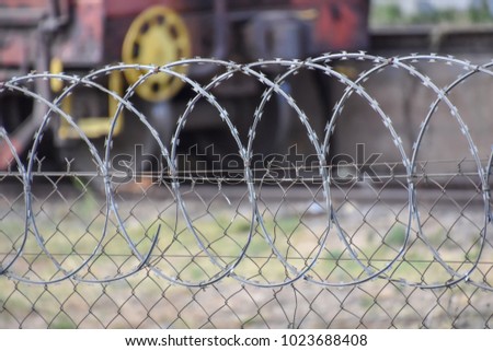 Barbed razor wire in Pretoria South Africa used as steel fencing constructed with sharp edges or points utilized to protect an area from unauthorized access