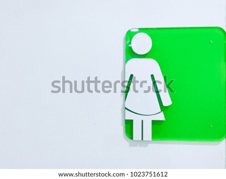 Ladies toilet sign or women icon with copy space and white background.