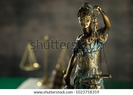  Law and Justice concept. Brown wooden background