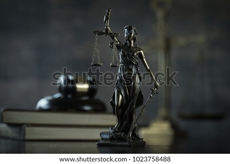  Law and Justice concept. Brown wooden background