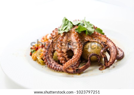 Mediterranean Octopus with vegetables and potatoes