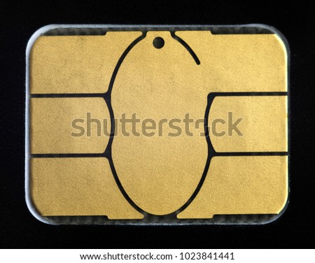 Credit card electronic chip. Extreme close-up.