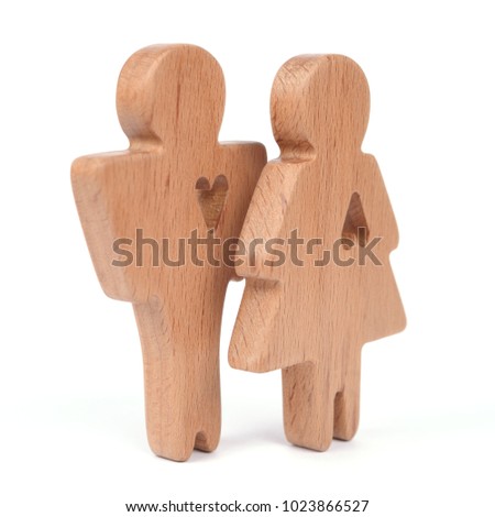 Silhouettes of man, woman and heart cut out inside the shapes on a white background. Happy couple in love. Male and female, different love ways