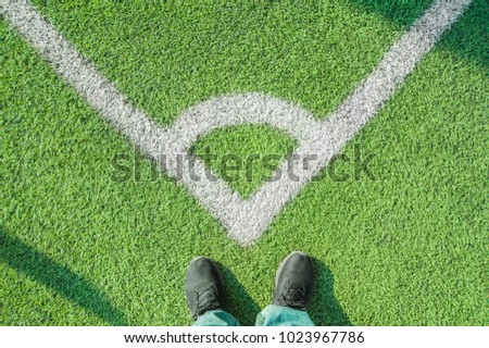 Flat lay of football corner on artificial soccer field 