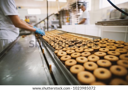 Cookie factory, food industry. Fabrication. Cookie production. Royalty-Free Stock Photo #1023985072