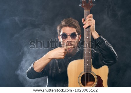 smoke, man in glasses with a guitar, rock, music                               