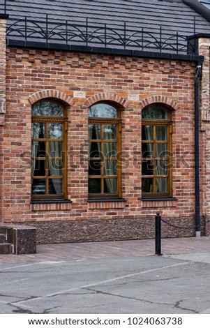 Beautiful facade of a brick building with large windows
