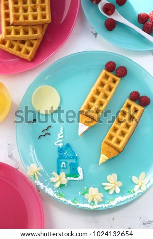 waffles without sugar for baby food, from coconut and corn flour. Food art. the picture is made of sugar glaze