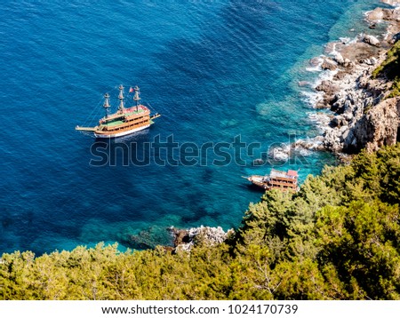 Aerial view to yacht at the blue see